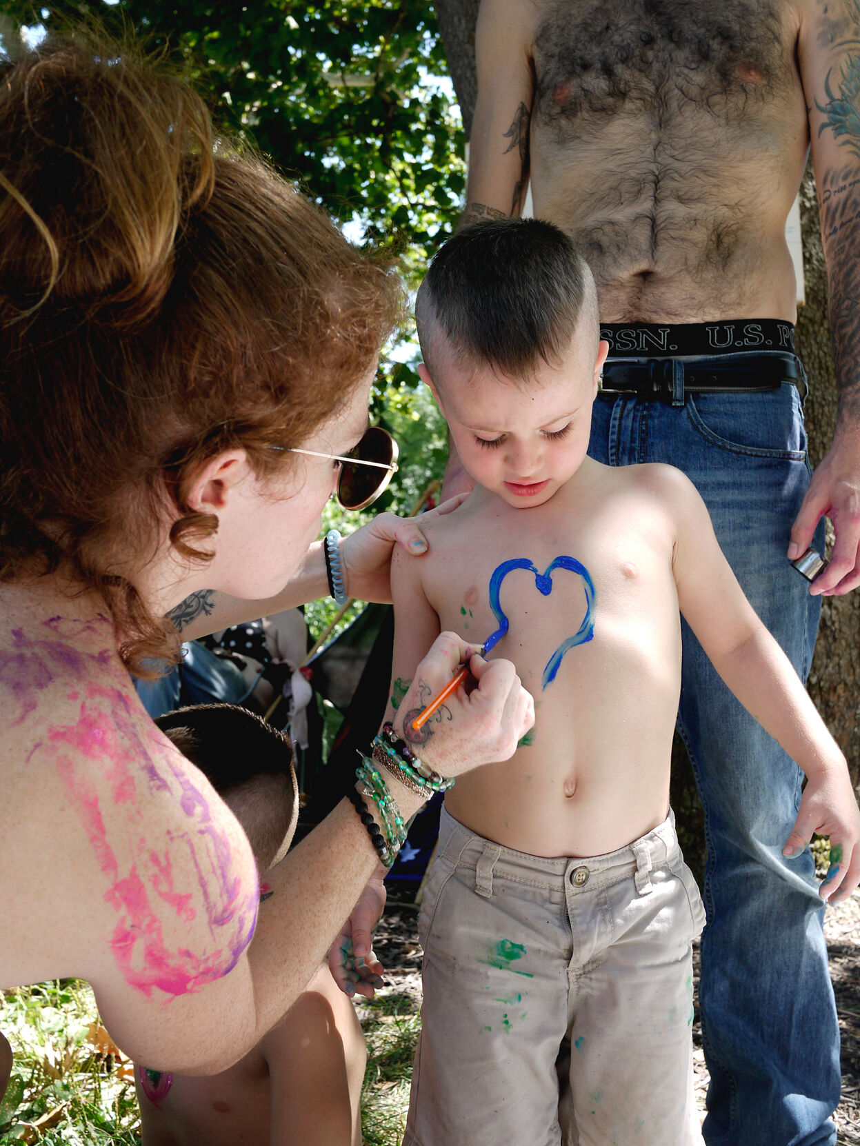 Tabia Jones paints her four-year-old son